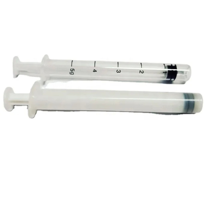 Applicateur vaginal jetable blanc à usage unique avec une surface lisse pour une application précise